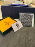 Портфейли Goyard