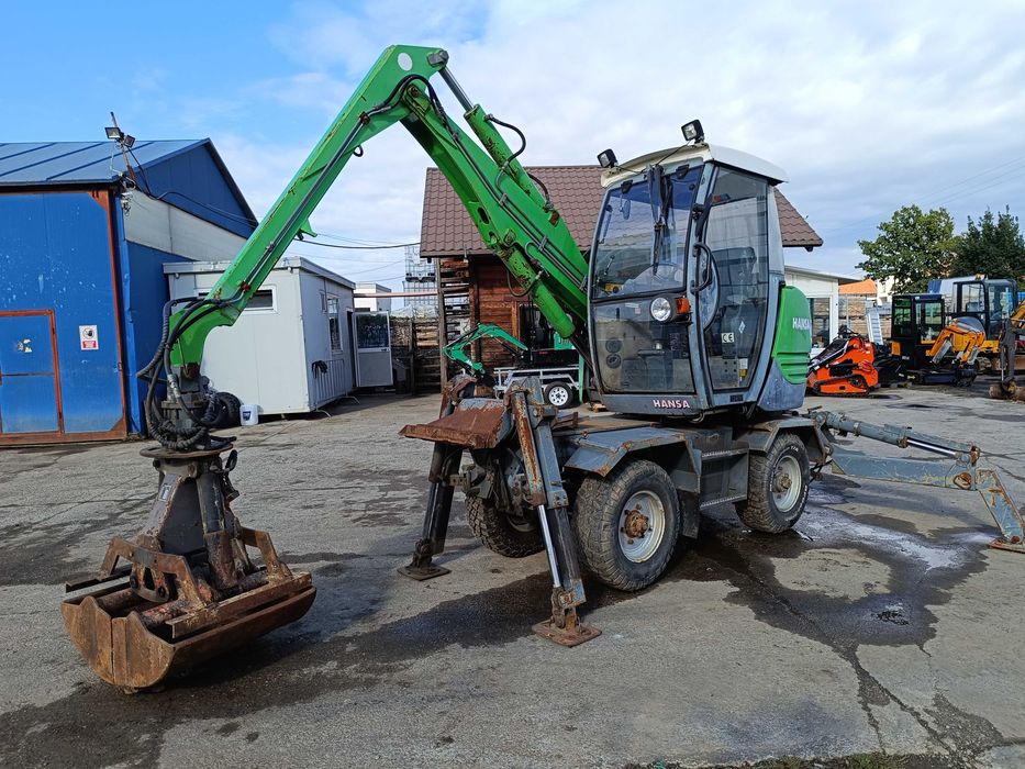Excavator pe roți HANSA APZ 531 – 2003 – graifer hidraulic rotativ