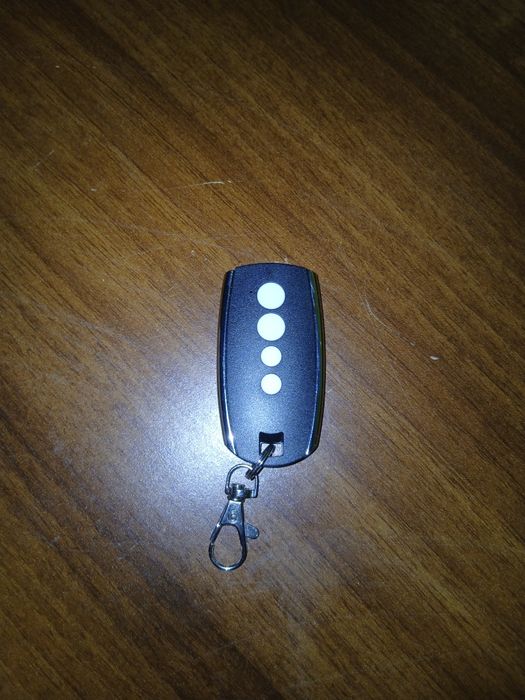 Telecomandă usă garaj