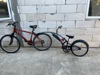 Bicicleta remorcată pentru copii