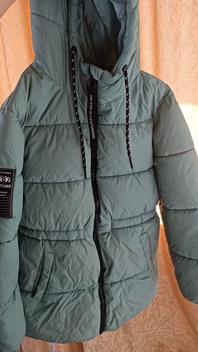 Продам осенние и зимние куртки и пуховики