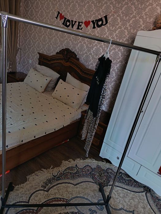 Bolalar va kattalar kiymini ilish uchun sushilka