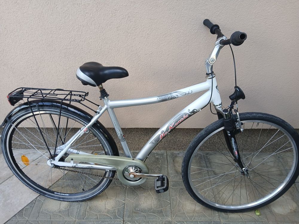 Bicicleta aluminiu, suspensii,  7 viteze în butuc