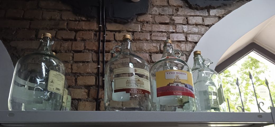 Продам стеклянные бутылки 5л