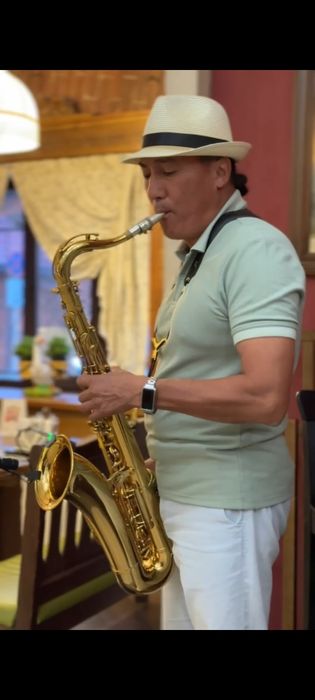 Саксофонист на мероприятие