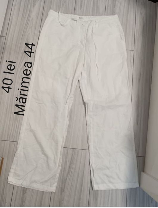 Pantaloni albi, damă