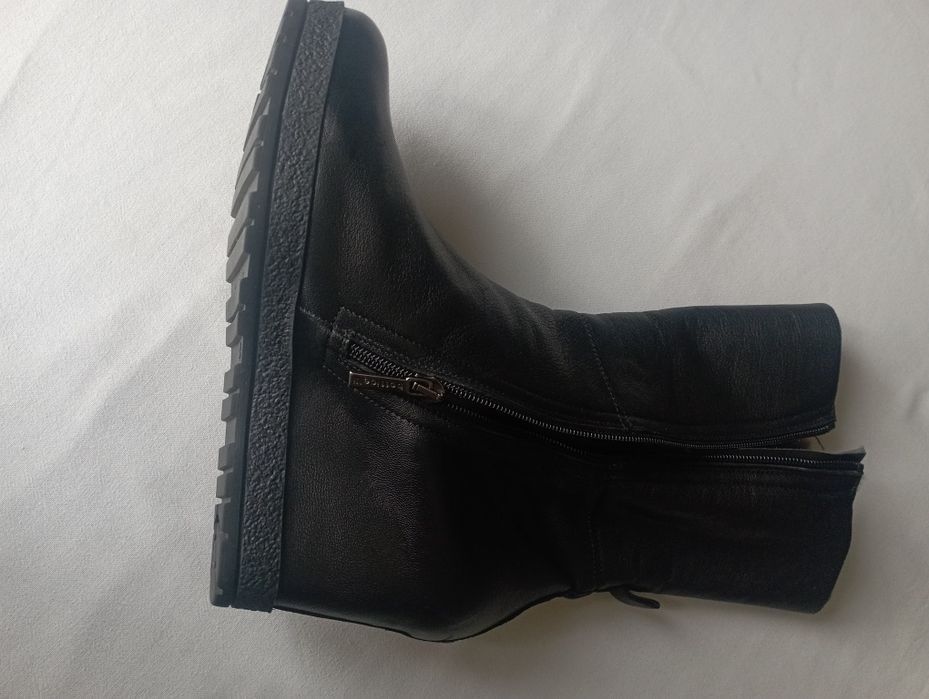 Продаю зимние сапоги