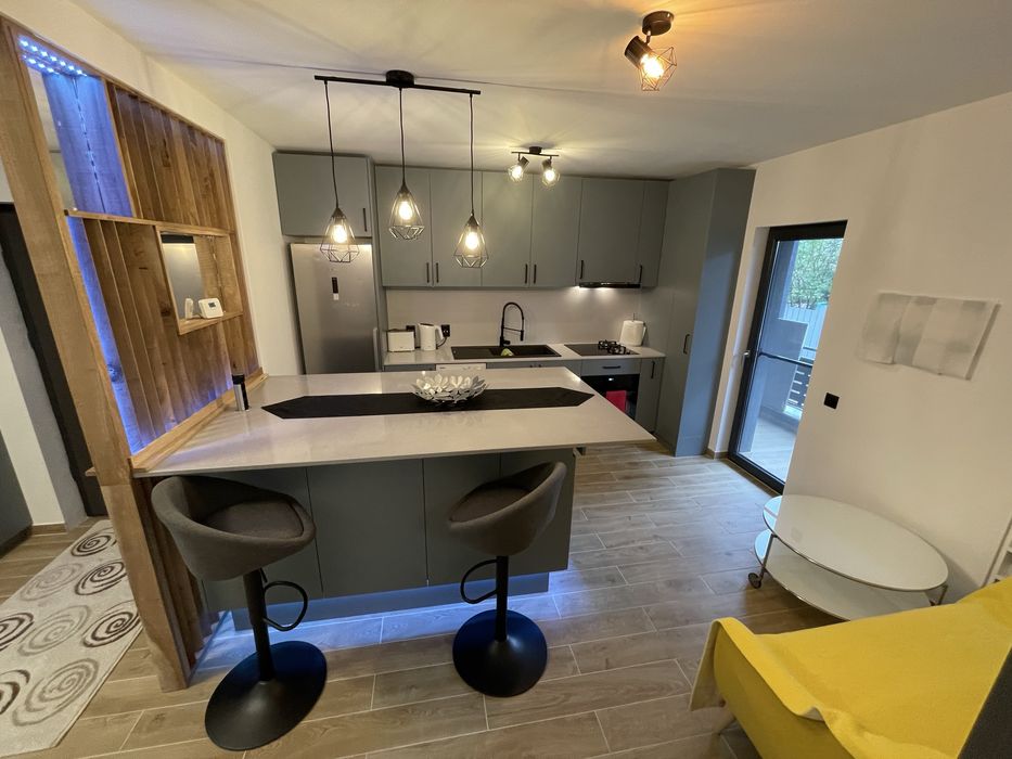 Apartament modern 2 camere Apahida parter bloc nou cu parcare si curte