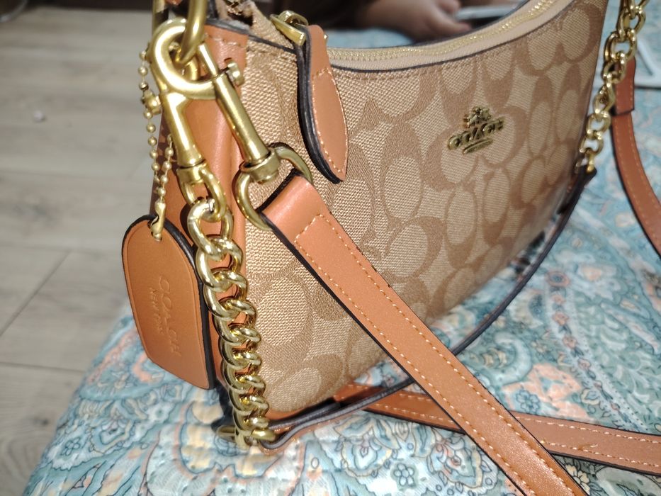 Продам сумку фирмы Coach в хорошем состоянии