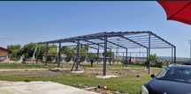 Vând hală metalică de pe stoc 10 m cu 20 m cu 4 m tot cu montaj