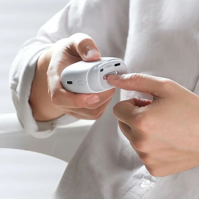 Электрическая кусачка для ногти