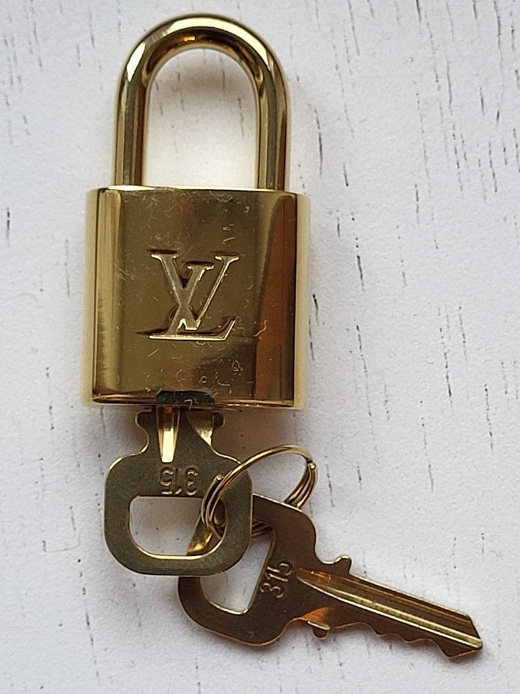 louis vuitton accesoriu geanta original