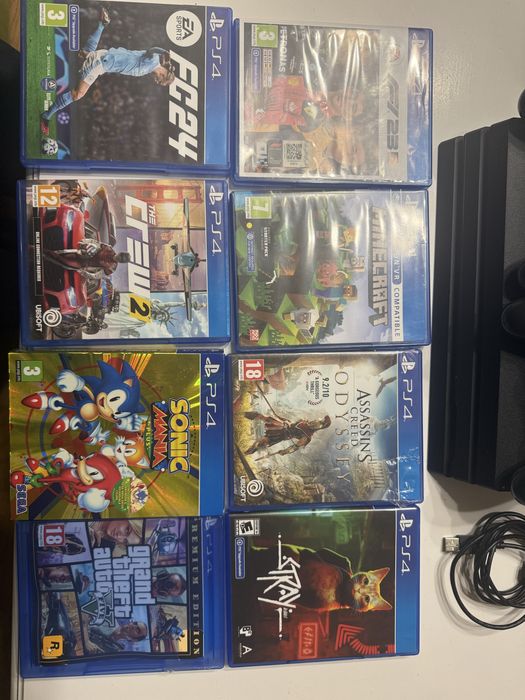 Ps 4 Pro 4K HDR 1 TB PlayStation cu 8 jocuri