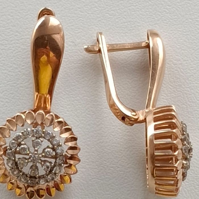 Продам золотые серьги