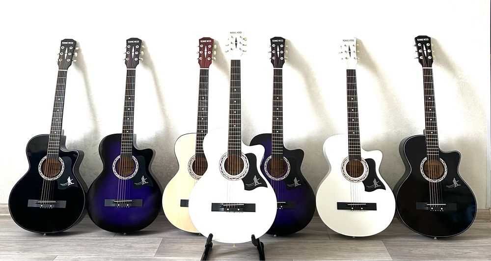 Новые в упаковке гитары