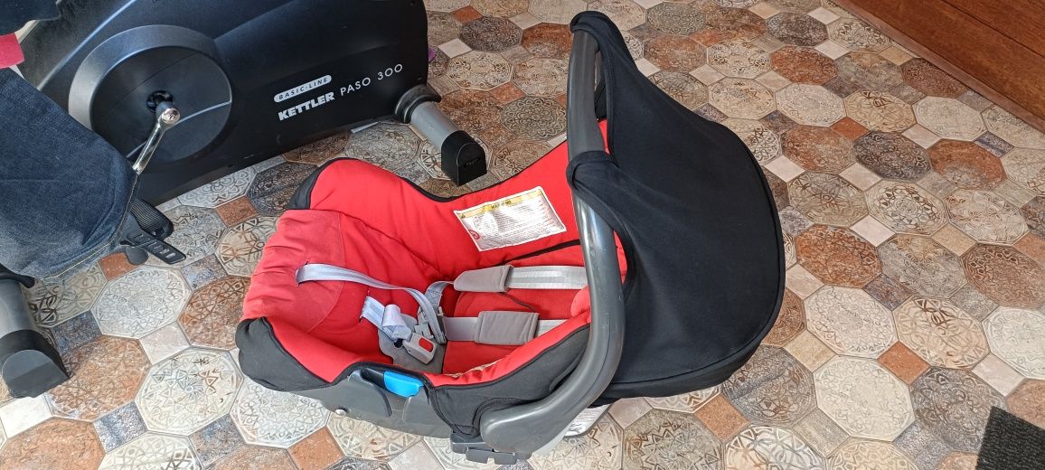 Scoică Britax Romer 0-13 kg cu prindere în centură cu spatele