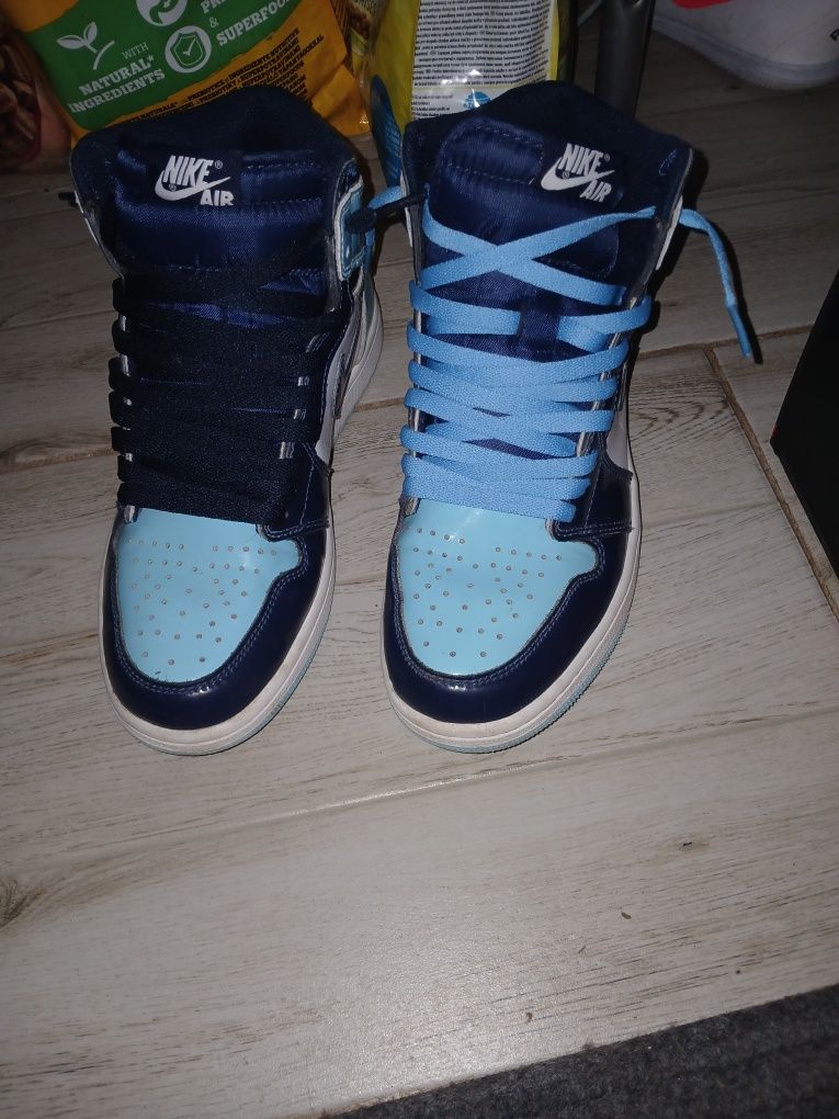 jordan 1 mid patent unc