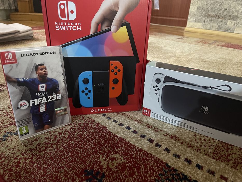 Nintendo Switch OLED + fifa 23, + husă, 64 GB plus un card de 128 Gb