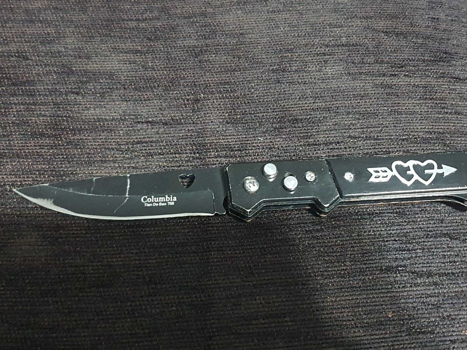 briceag columbia  - utilizat