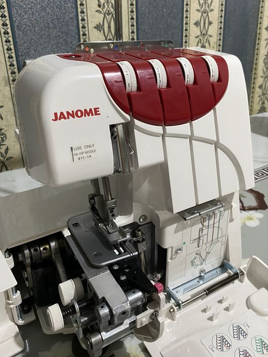 Janome оверлок 9
