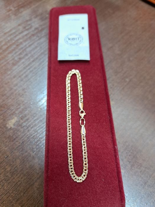 Продам новый золотой браслет