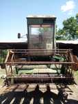 Combina John Deere 330