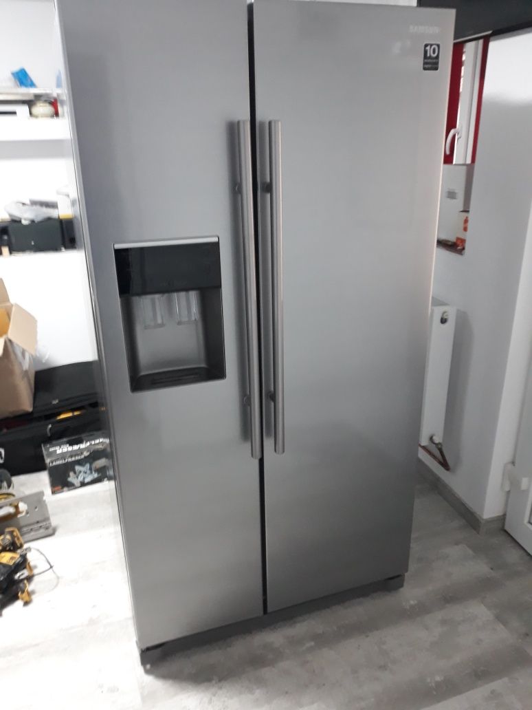 Combine frigorifice marca SAMSUNG model Side by side,aduse din DK