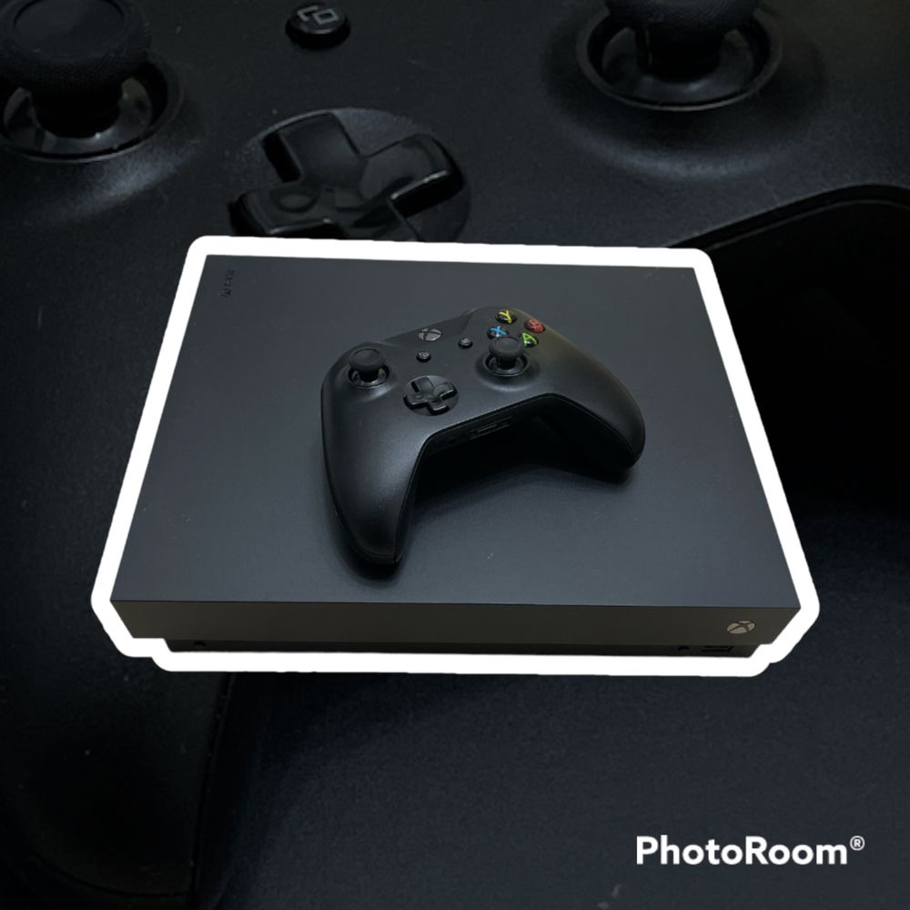 Продам игровую приставку XBox One X 1 TB