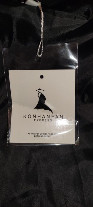 Дамски пухен елек с качулка