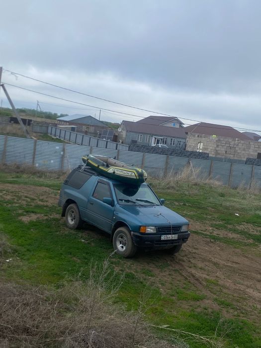 Опель фронтера спорт