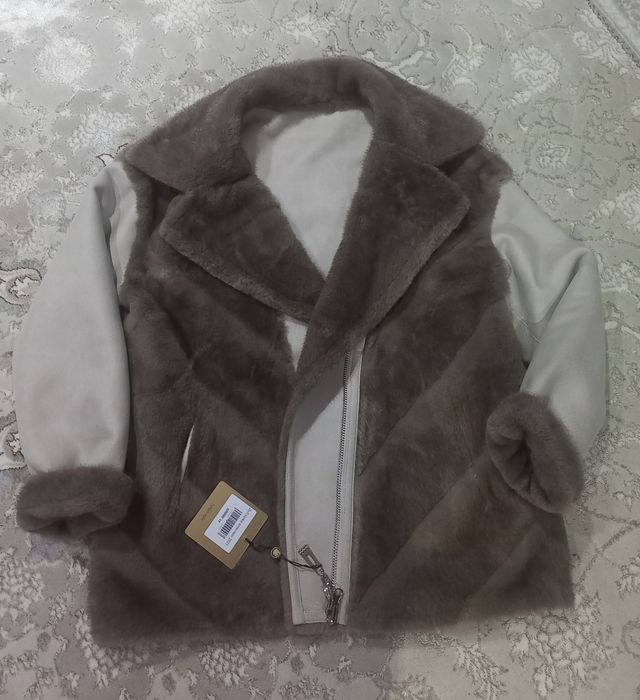 Продам дублёнку новую