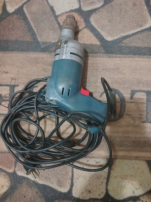 Электрическая дрель