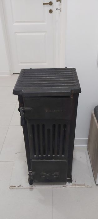Sobă șamotată cu burlane, coturi și radiator de căldură