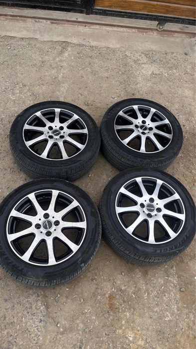 Титан с покрышкам