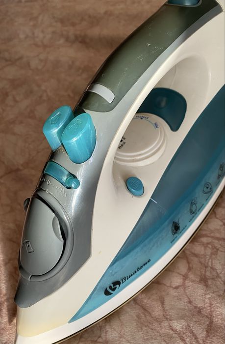 Утюг рабочий . Binatone