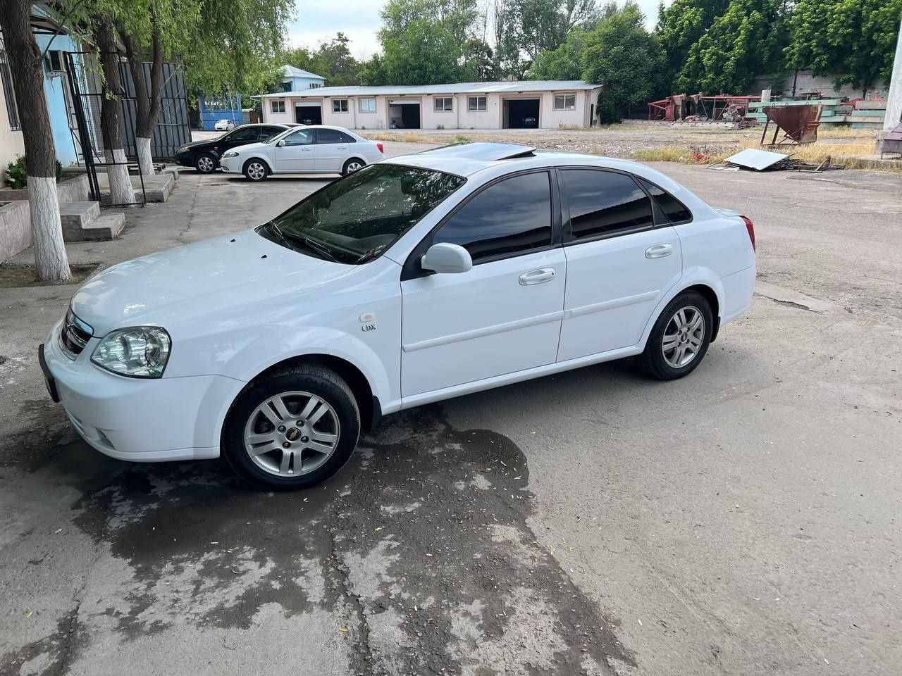 Lacetti 2009, белый