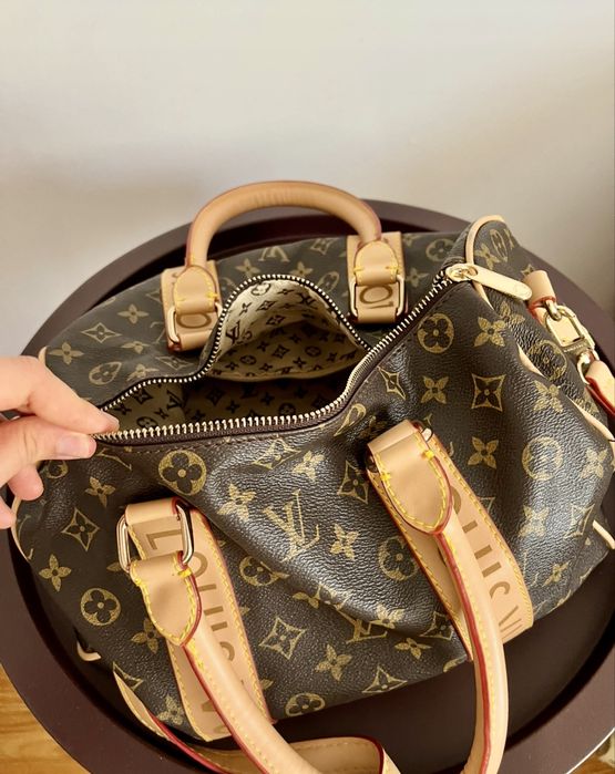 Geanta de umar Louis Vuitton