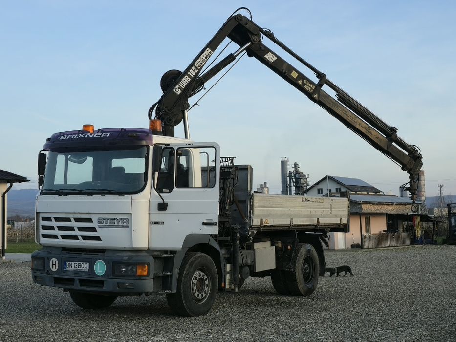 Camion 4x2 MAN Steyr 4x2 basculabil cu macara HIAB 102