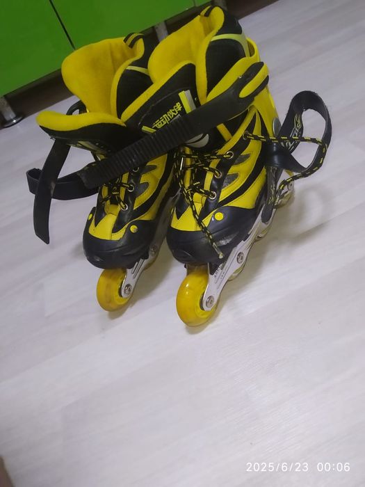 Роликовые коньки