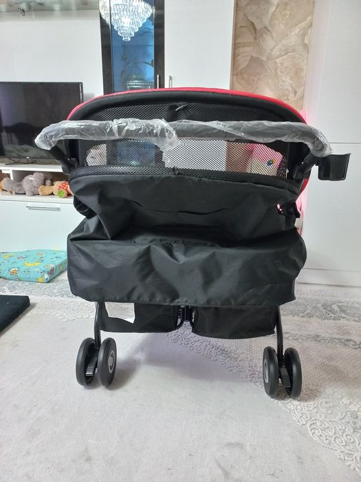 Двухместная коляска