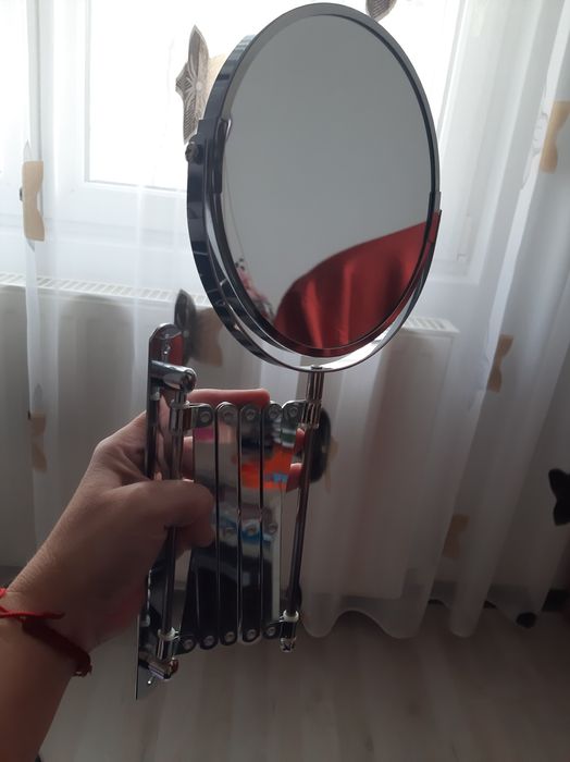 Oglinda pliabila cu doua fete