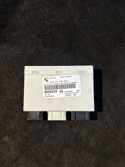 Modul pdc senzori parcare Bmw seria 3 e90/e91 2.0d n47 177cp cod poza