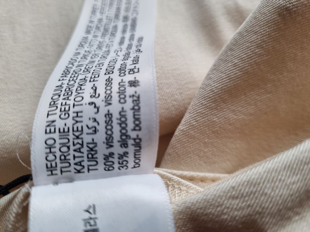 Pantaloni Massimo Dutti elastici alb-crem, 34, noi cu etichetă