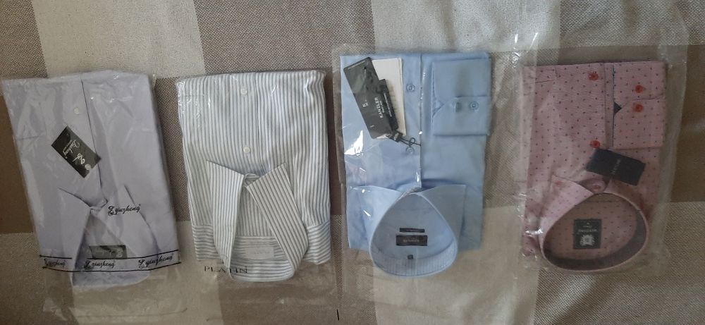 Рубашки мужские новые