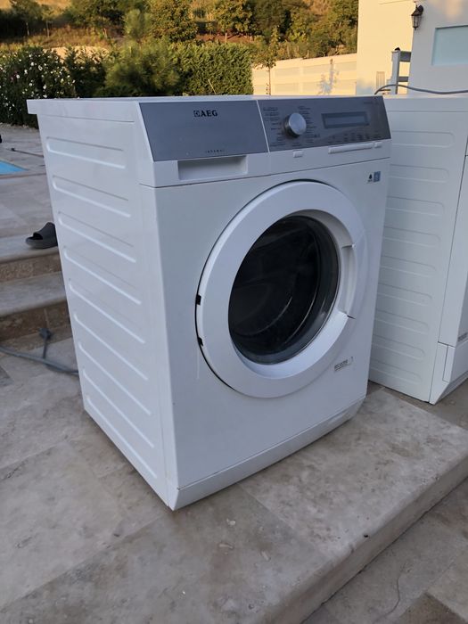 Masina de spalat si uscator de rufe AEG cu pompa de caldura