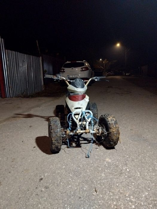 De vânzare atv de 49cc  funcționează are și motor de motocoasă