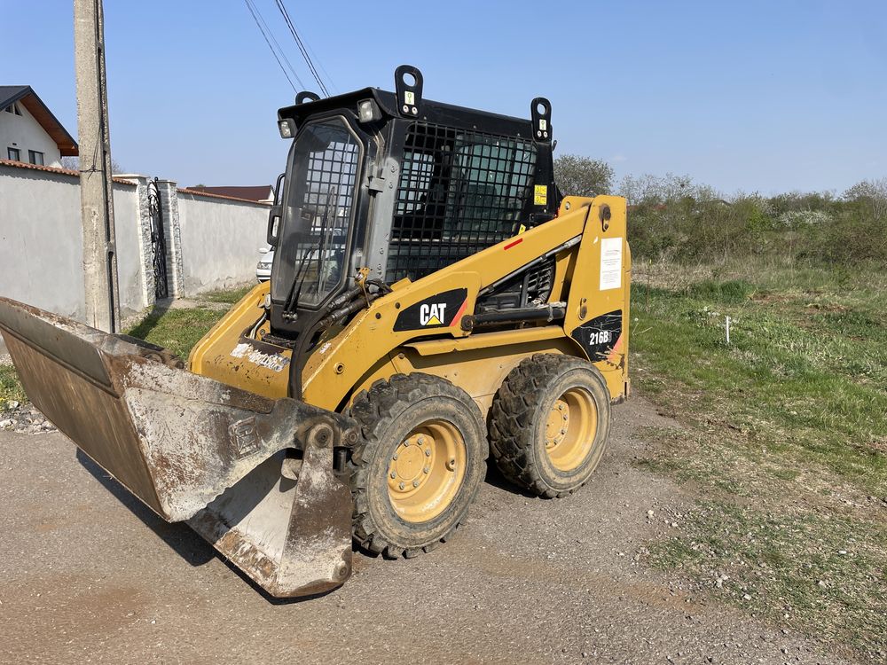 Mini incarcator bobcat Caterpillar 216B3 cupa multifunctionala