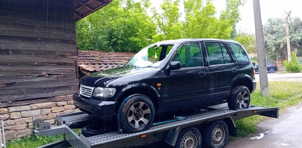 Kia Sportage на части