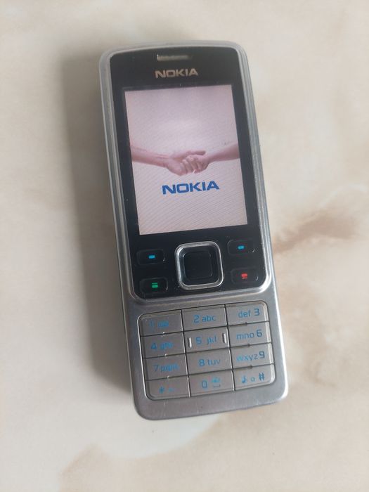 Vând Nokia 6300 Silver, perfect funcțional și NEcodat //poze reale