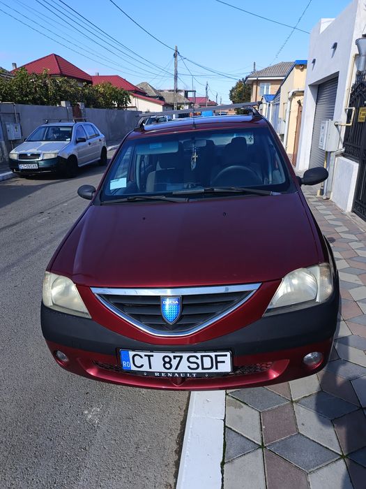 Vând Dacia Logan